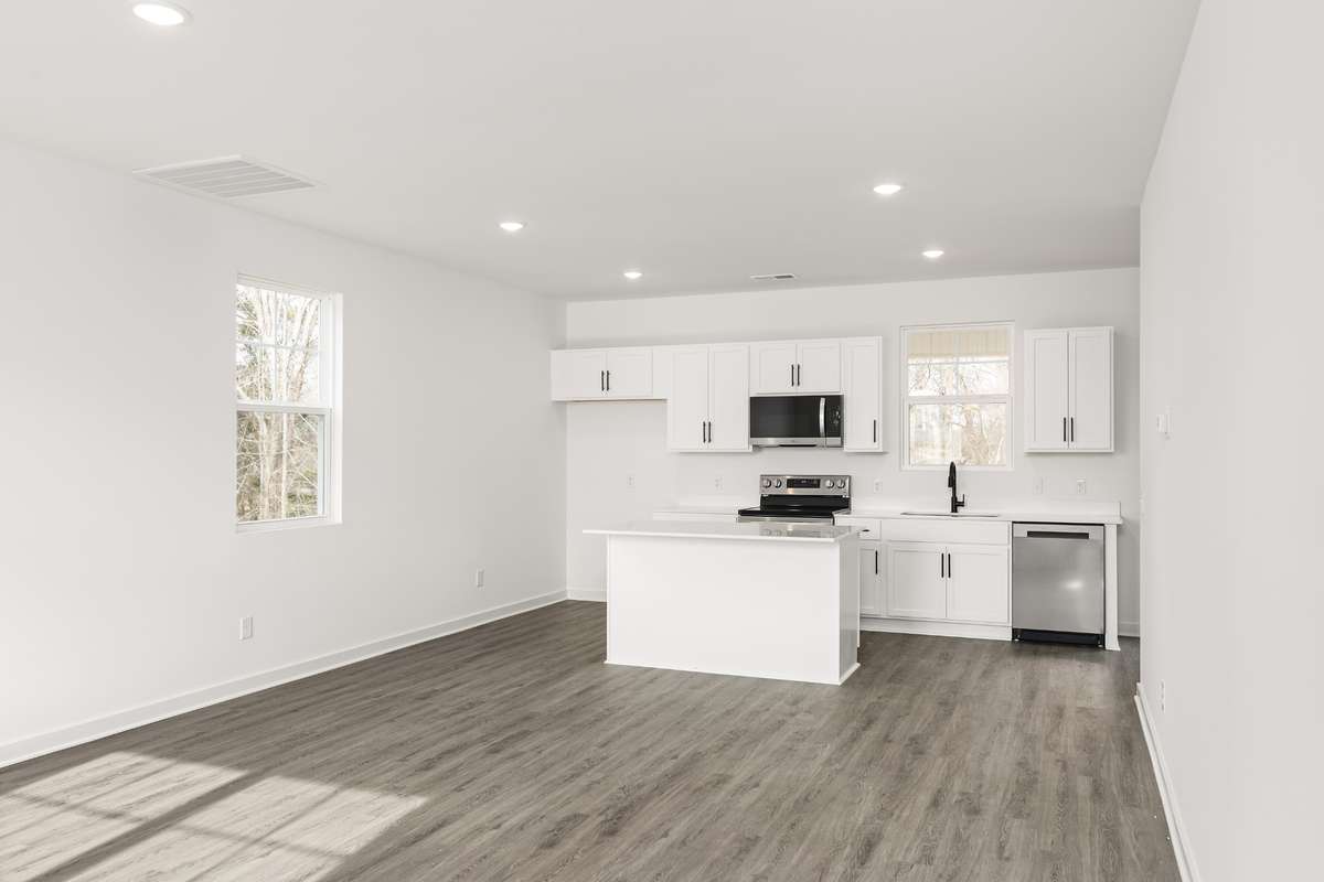 Photos of similar home! Model home available to tour, staged with furniture for visual reference!