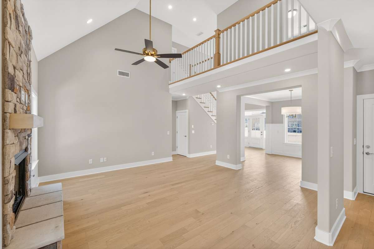 Living room with vaulted ceilings and gas fireplace