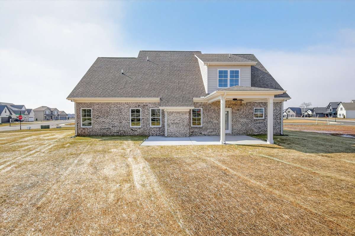 Large backyard with covered patio