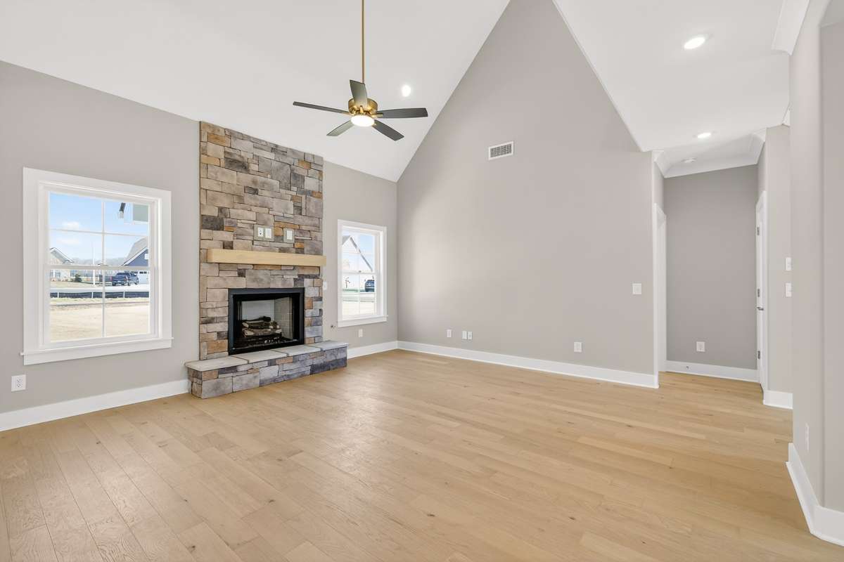 Living room with vaulted ceilings and gas fireplace