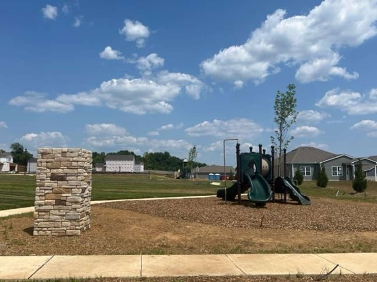 The playground also includes open space where you could have a picnic or throw around the football.