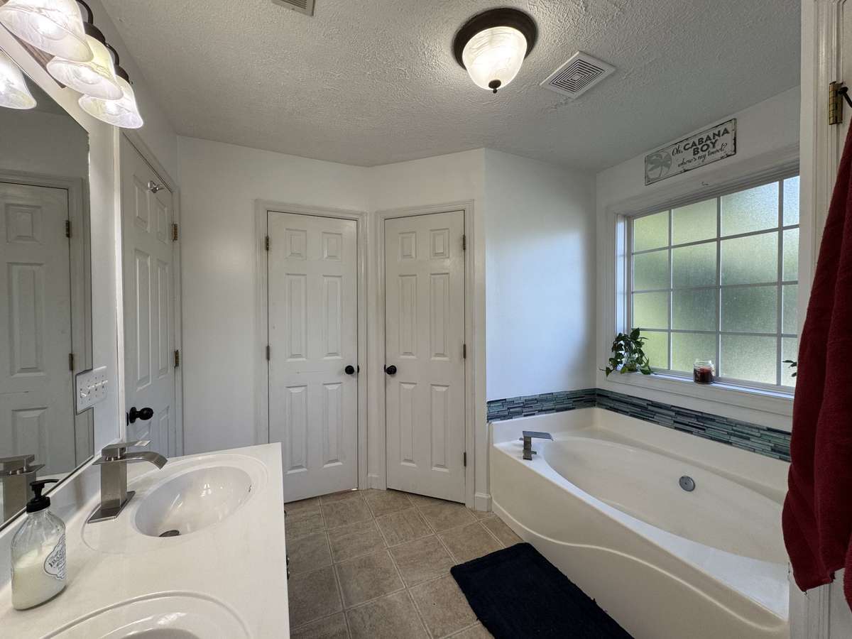 Plenty of Storage with his and hers closets.