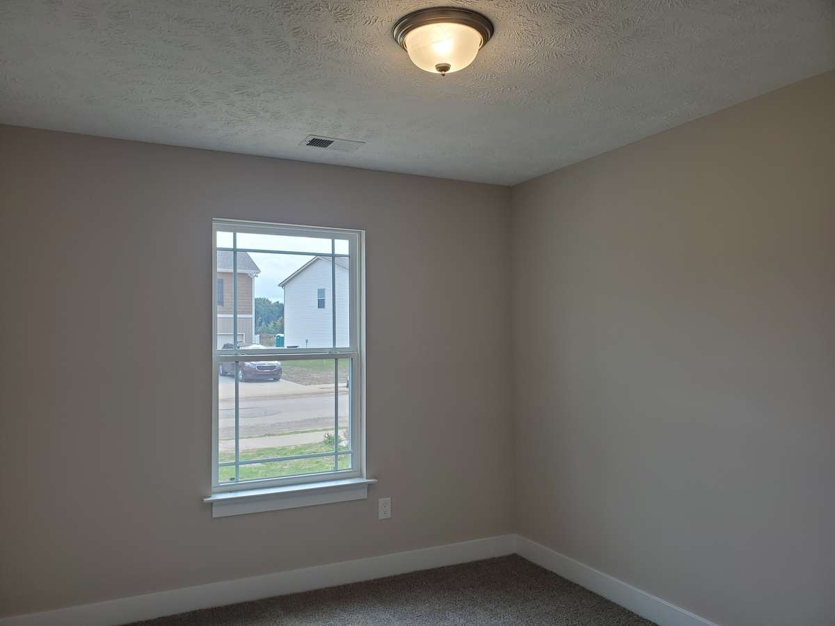 Owner's Suite has Plenty of Wall Space for Your Bedroom Furniture. Picture of Similar House.
