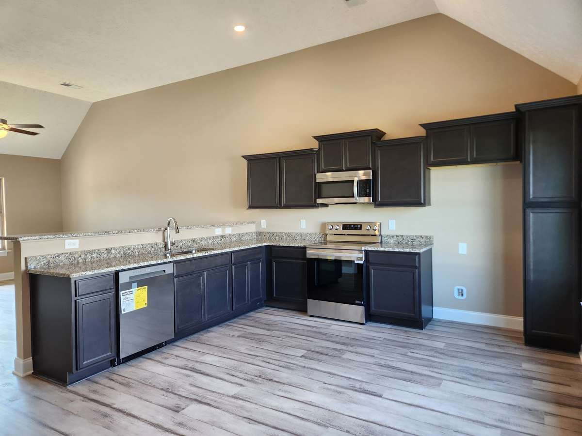 Kitchen will have Custom Cabinets with Cabinet Pantry,