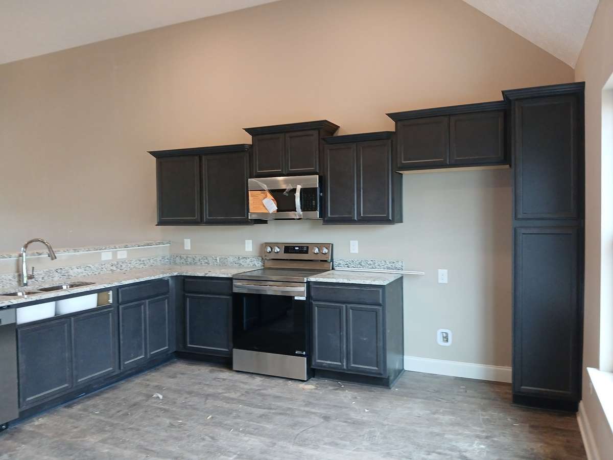 Kitchen has an Abundance of Custom Cabinets and Cabinet Pantry. 
Picture of Previous house.