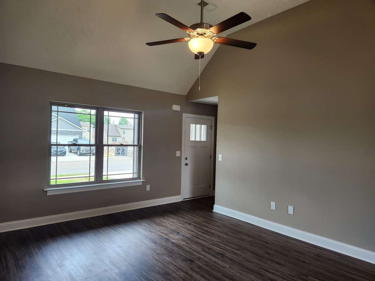 Spacious Living Room with Vaulted Ceiling.