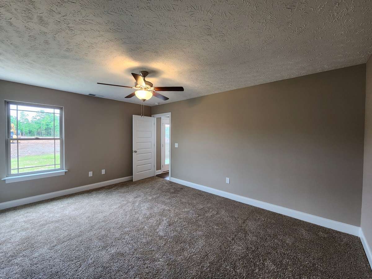 Spacious Owner's Suite has extra wall space for all of your Bedroom Furniture.