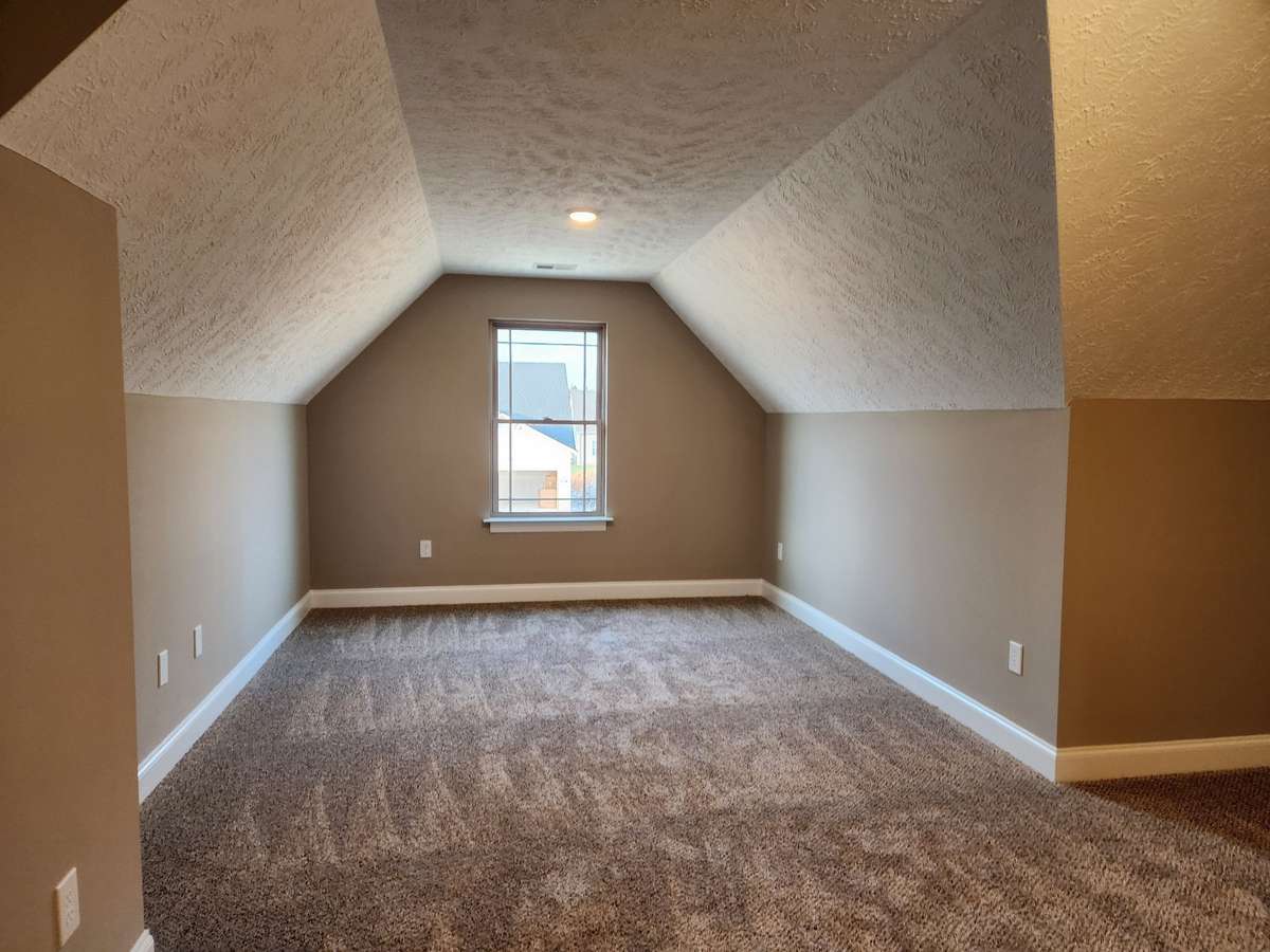 Spacious 4th Bedroom/Bonus Room Upstairs. 
Picture of Previous House.