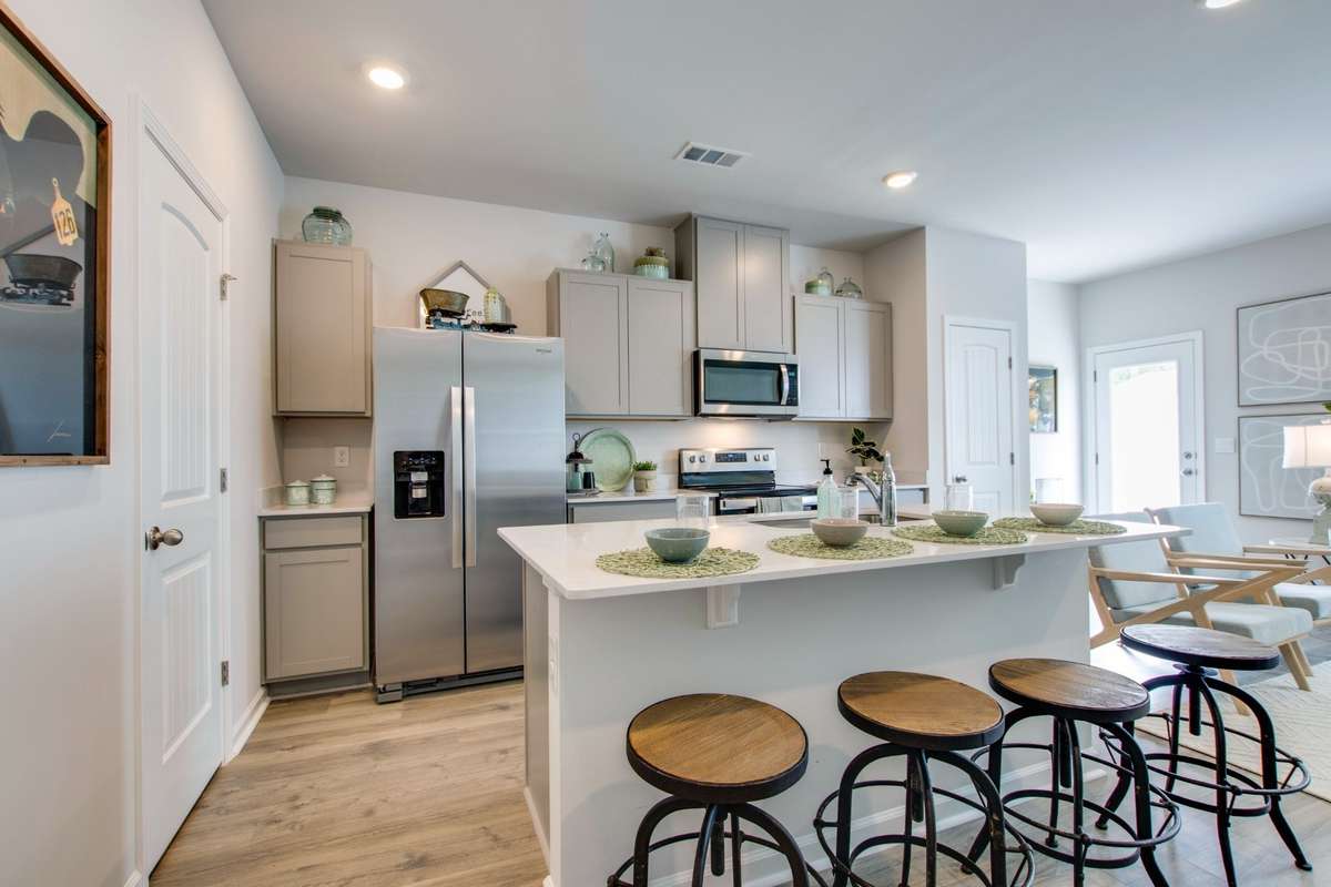 PHOTOS ARE SAMPLES OF HOME IN ANOTHER COMMUNITY