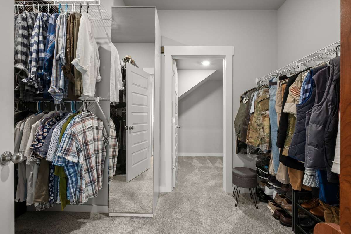 You have a walk-in closet, with additional storage under the stairs to the second level.