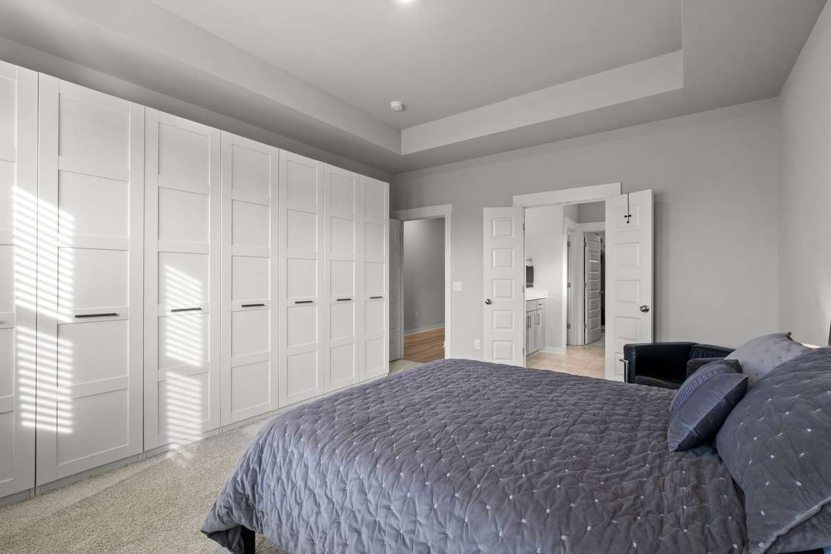 Built-ins provide even more storage when combined with the walk-in closet.