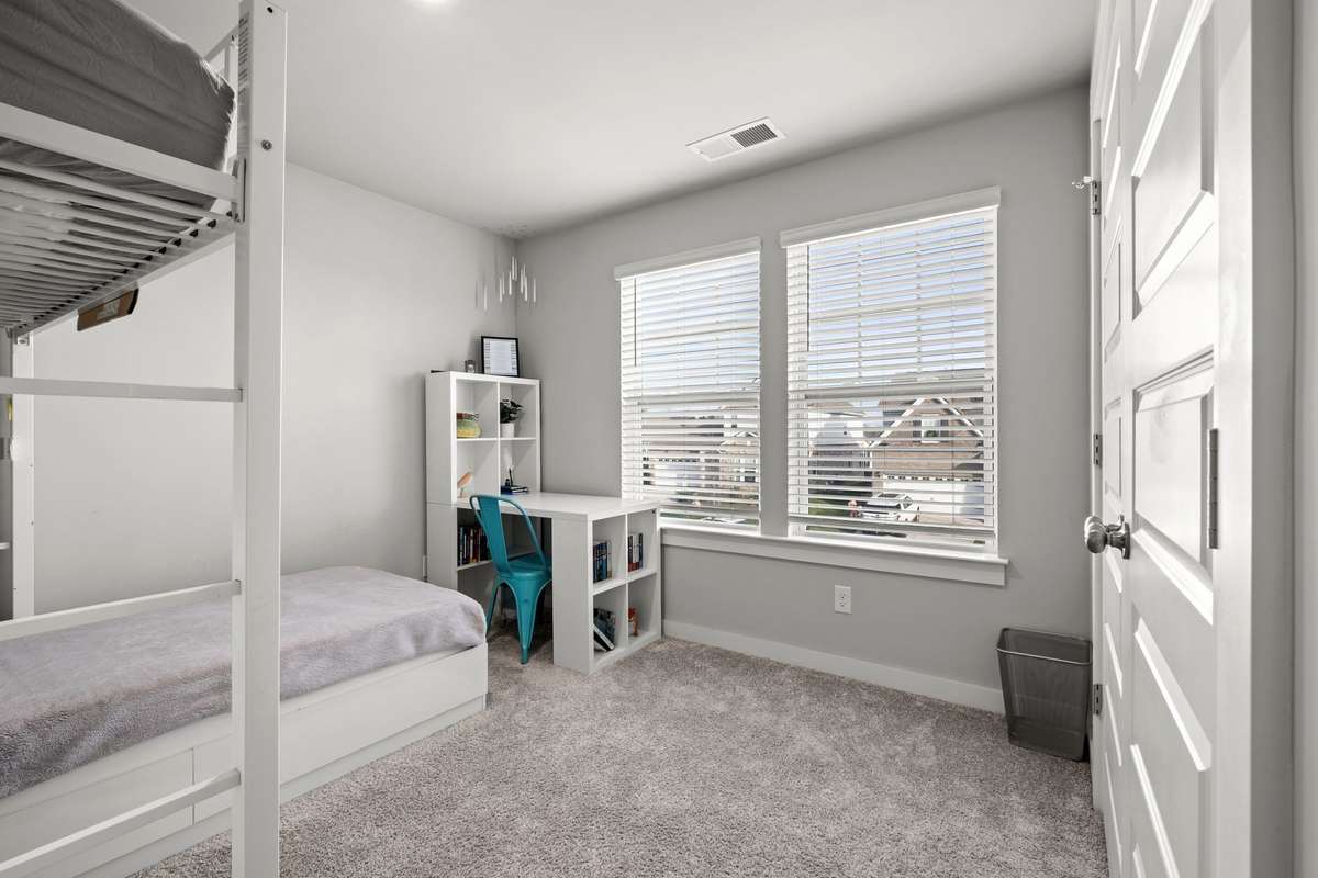 Bedroom 3 overlooks the front of the home.