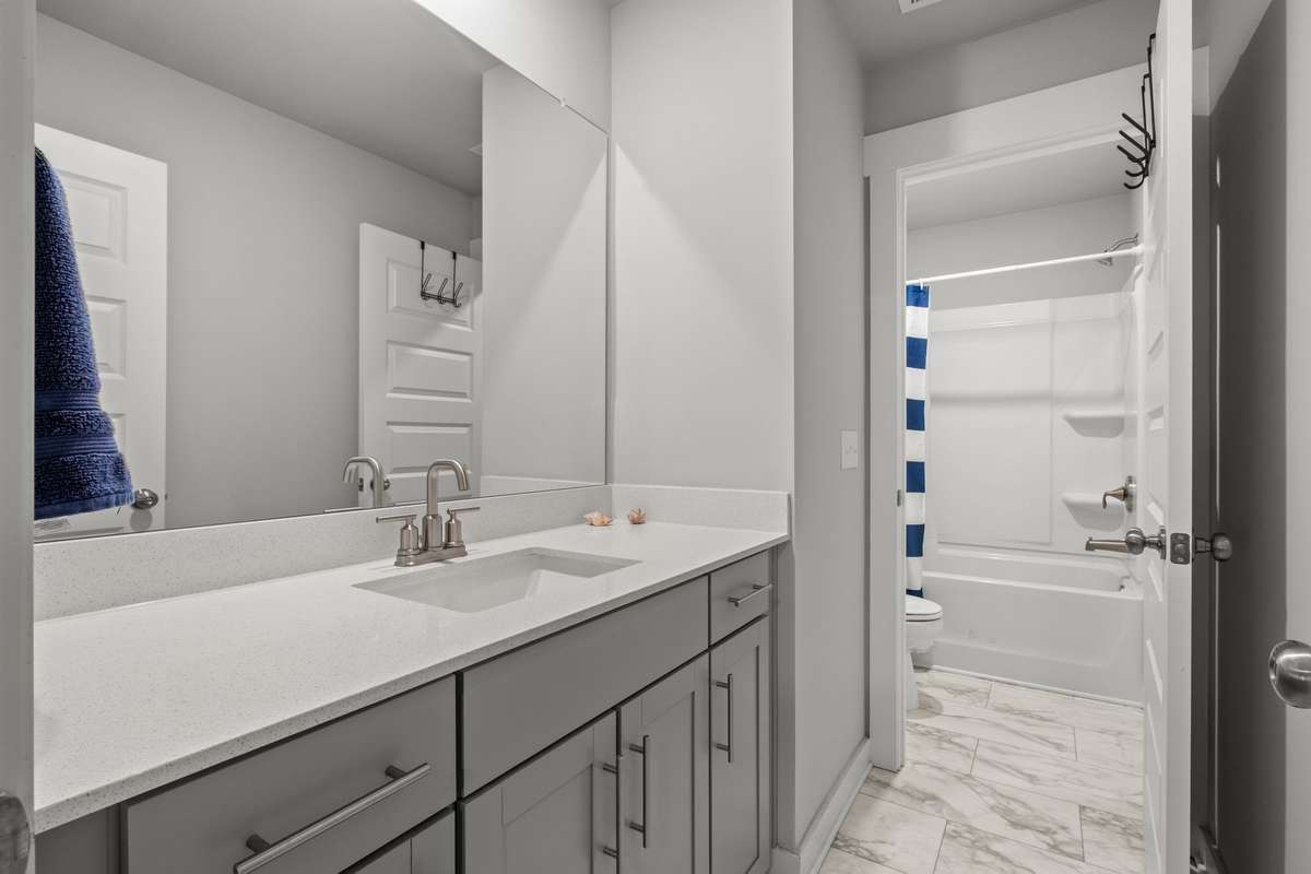 Private vanity area for Bedroom 2.