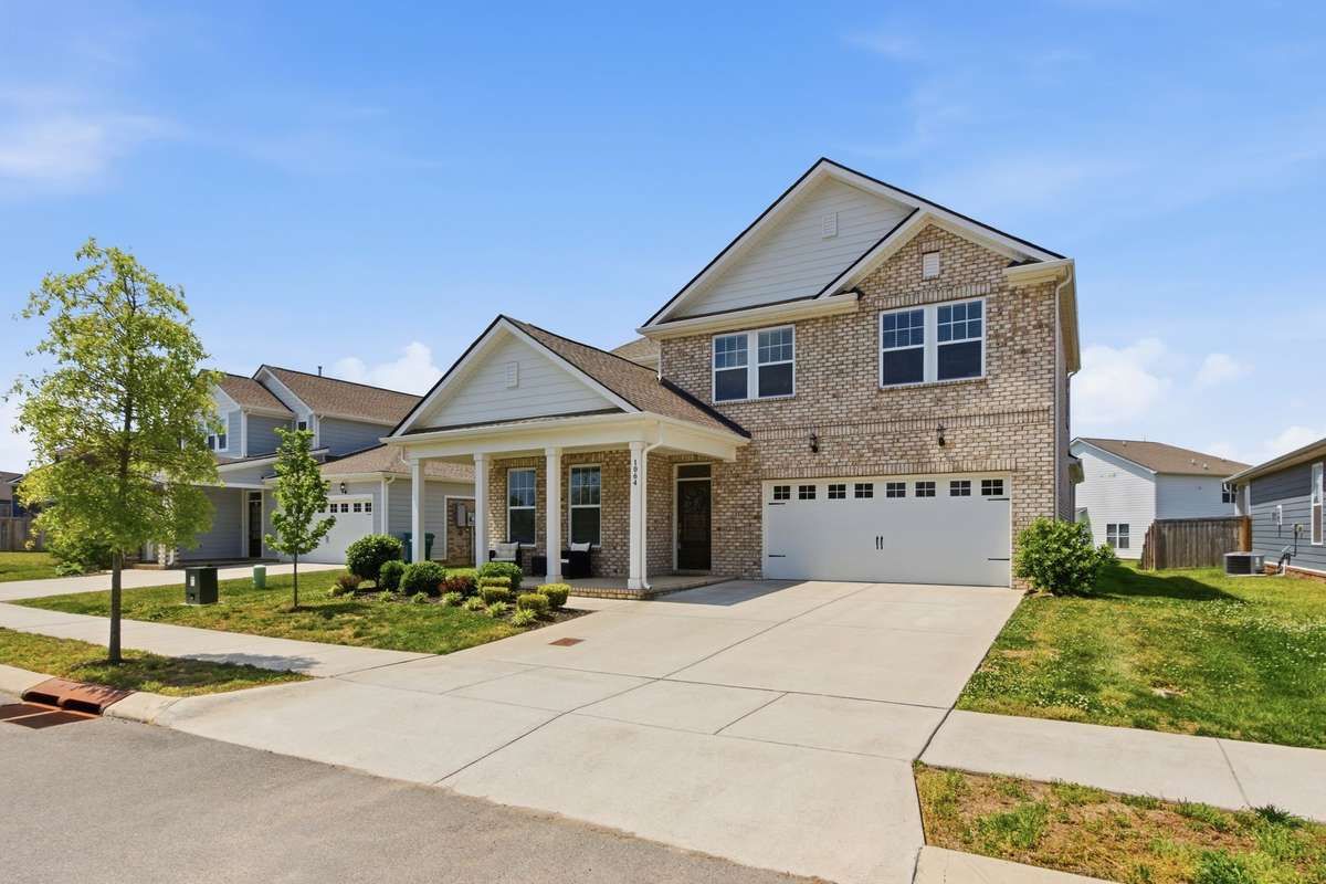 Welcome to Harvest Point. This home, built in 2022, features the Warner plan, one of the most sought-after 4-bedroom plans.