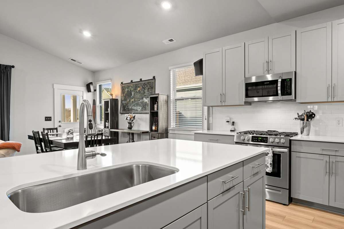 The home features stainless appliances (Frigidare package).