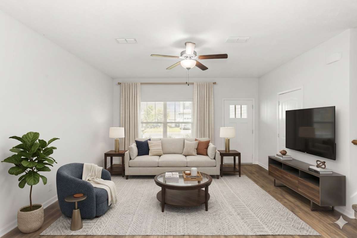 Another view of the living room with furniture Virtually staged
