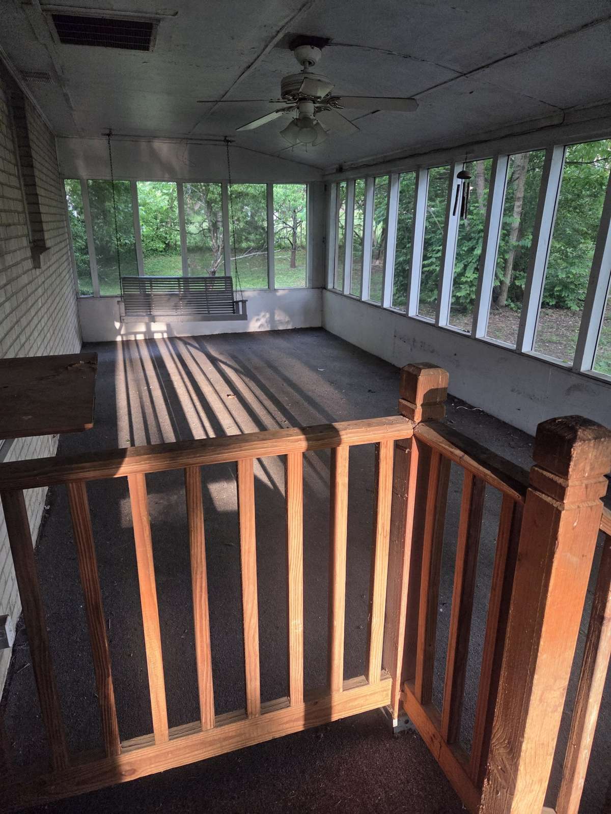 Huge screened in porch with swing