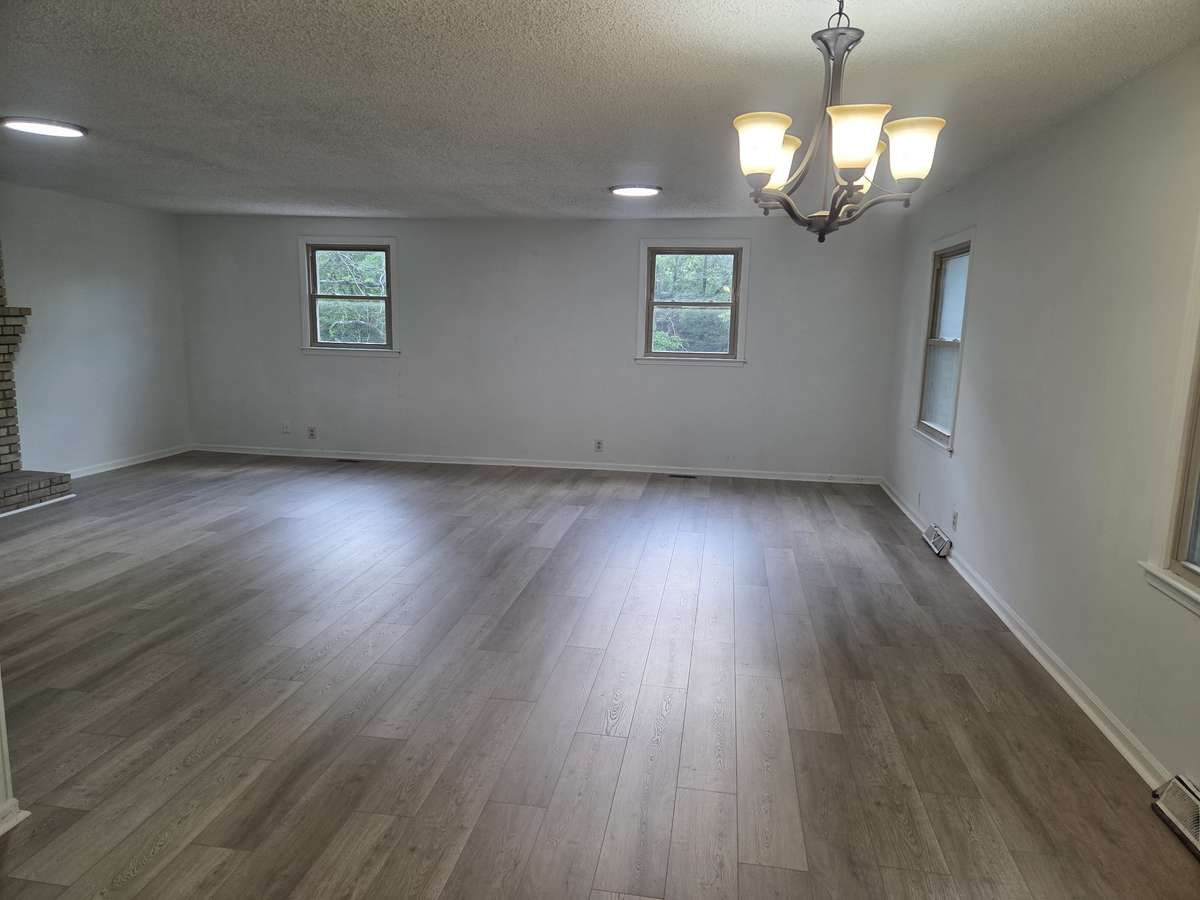 Great size living room area with new flooring
