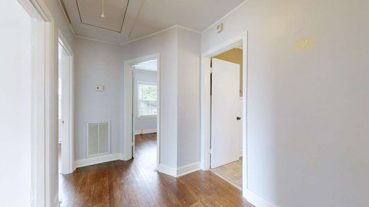 Full Attic for storage with pull down stairway in the Hallway.
