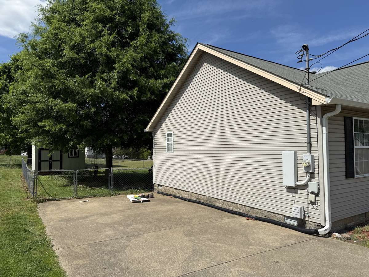 Driveway side of home.