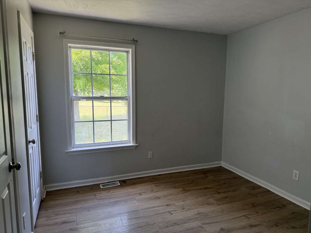 Third bedroom located at the back of the home.