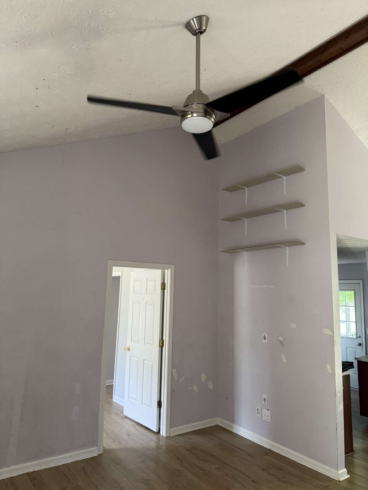 Additional shelving and decorative ceiling accent.