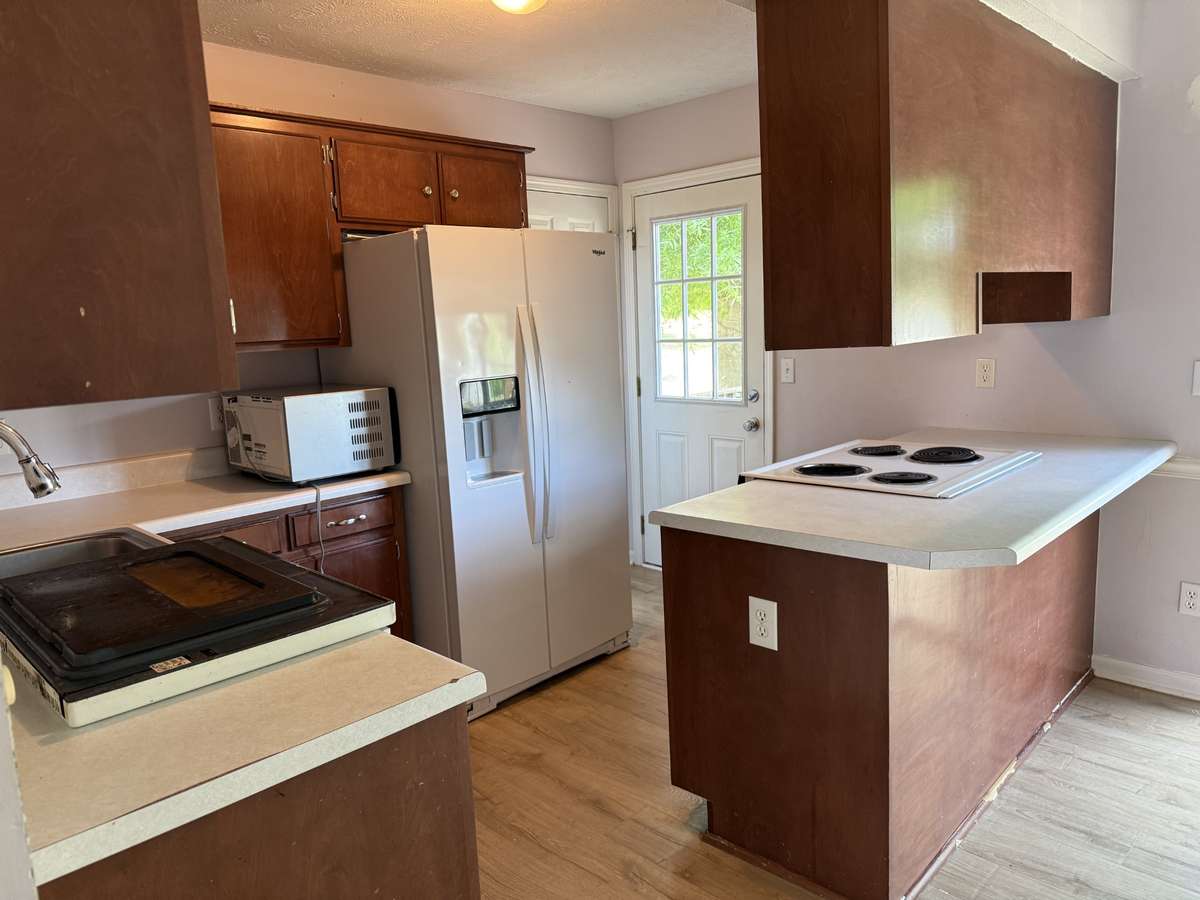 Plenty of cabinets and countertops.