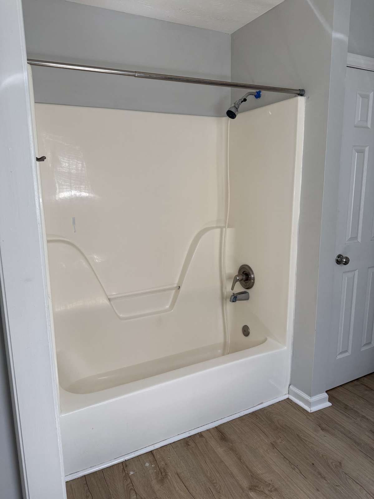 Tub/shower combo in primary bath.  Linen closet too!