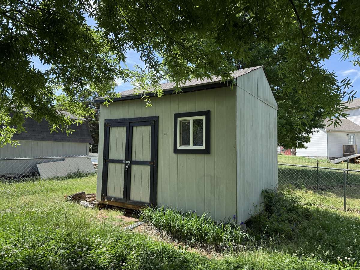 Storage shed remains.