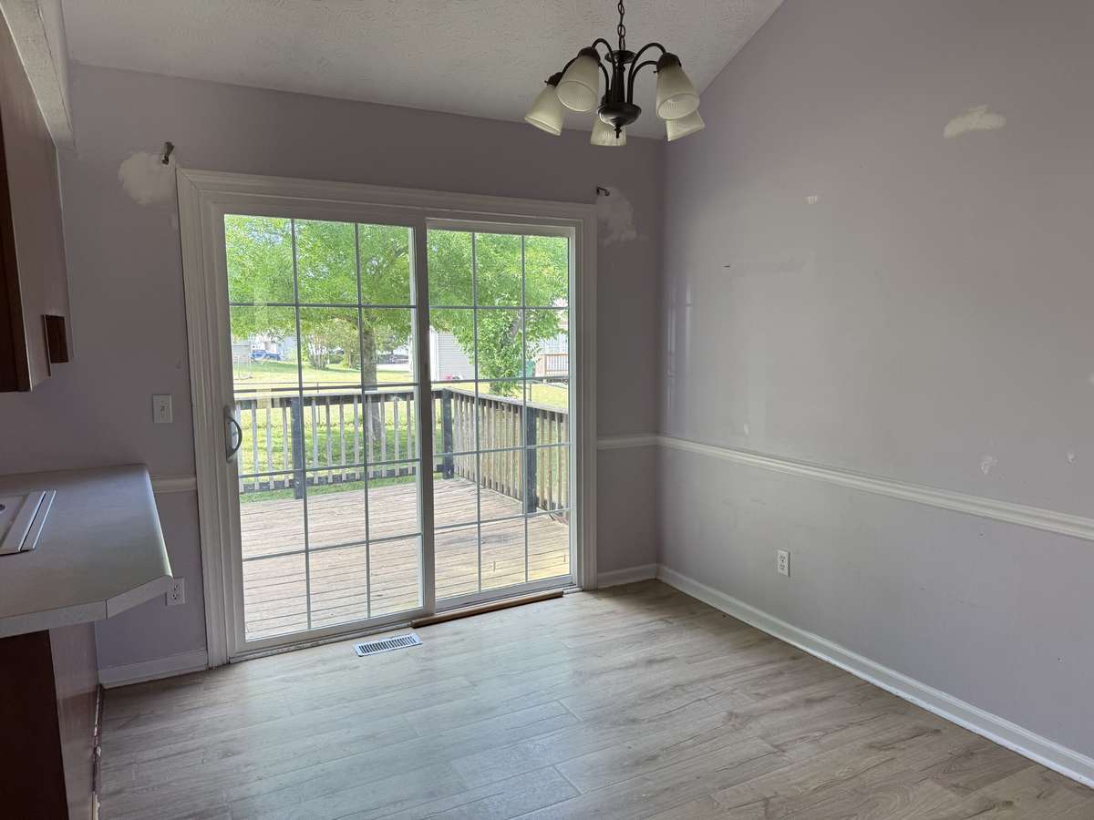 Sliding door provides additional access to back deck.