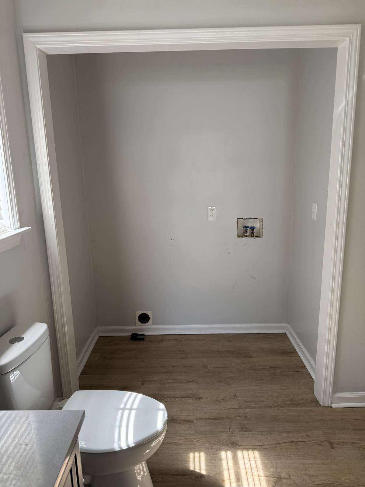 Laundry hook-ups located in primary bathroom.