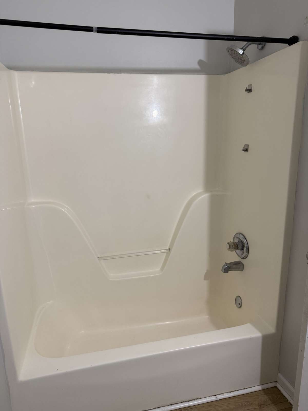 Tub/shower combo in hall bathroom.