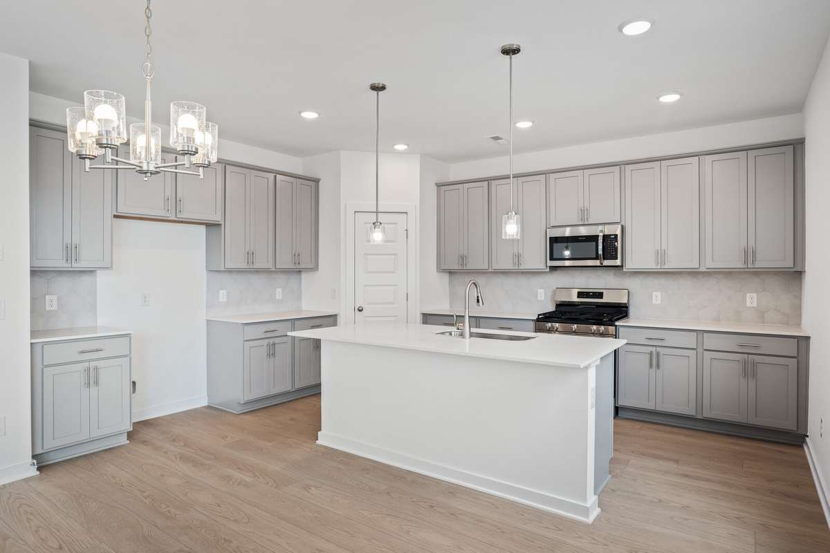 Picture of model home and not of actual home being built.  Colors and selections may vary