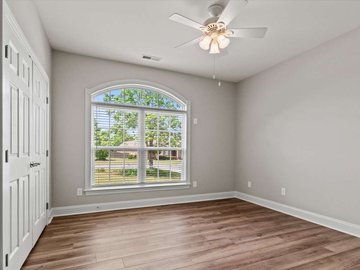 Bedroom - LVP flooring, ceiling fan