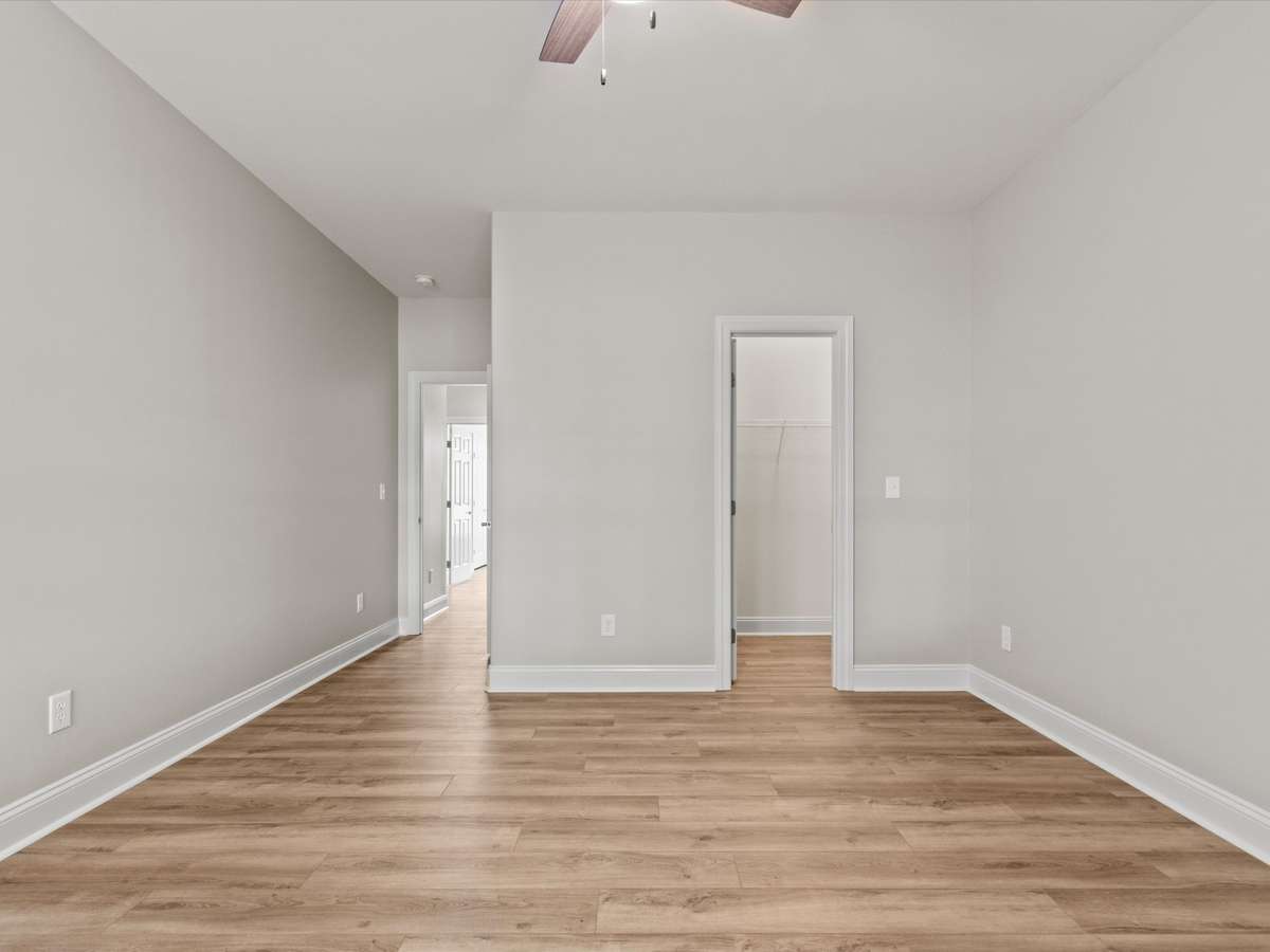 Bedroom - LVP flooring, ceiling fan