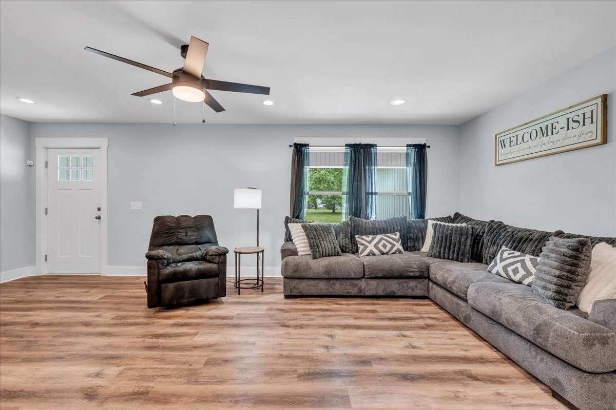The luxury vinyl flooring adds a touch of elegance, combining durability with aesthetic appeal.