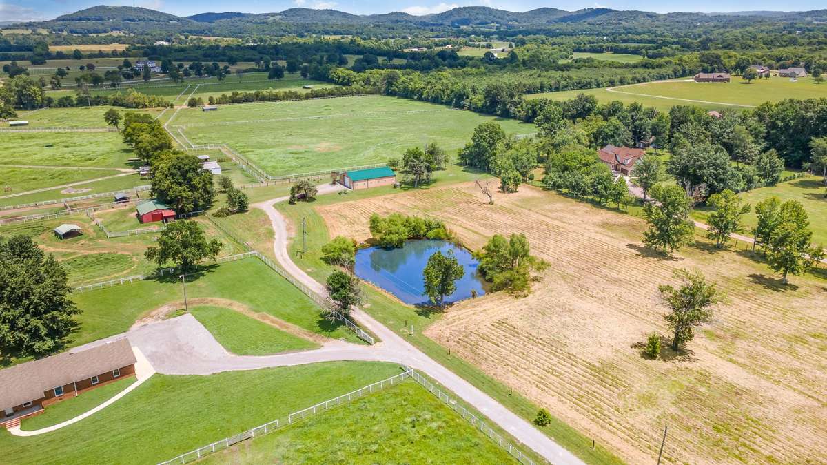 Look at this beautiful Tennessee property.  In addition to the smartly designed and beautifully finished home, the 7 acres, stocked fishing pond, and associated peace and tranquility offer what so many today are looking for.