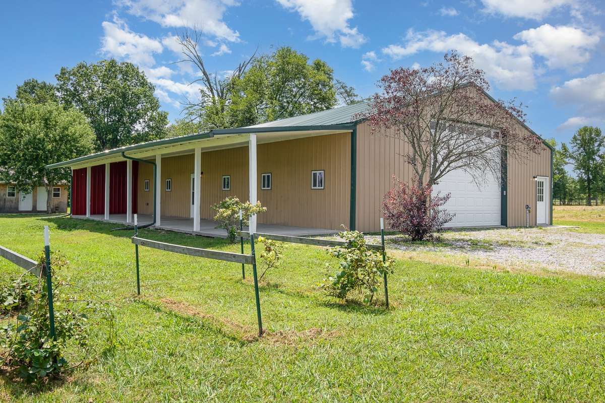 At 60' x 40' overall, with a full length covered porch on one side, this unique home was built in 1999 and has been tastefully updated over the years. With nearly 1,750 square feet of dedicated living space, plus an attached garage, options abound.