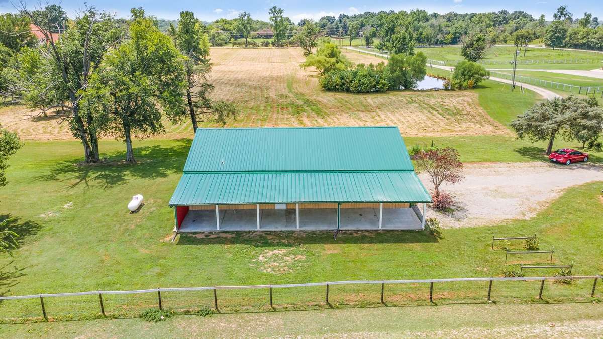Here we get a better perspective of the property in it's entirety. This view is looking back toward Hwy 82 East and the driveway on the right brings you to the home.