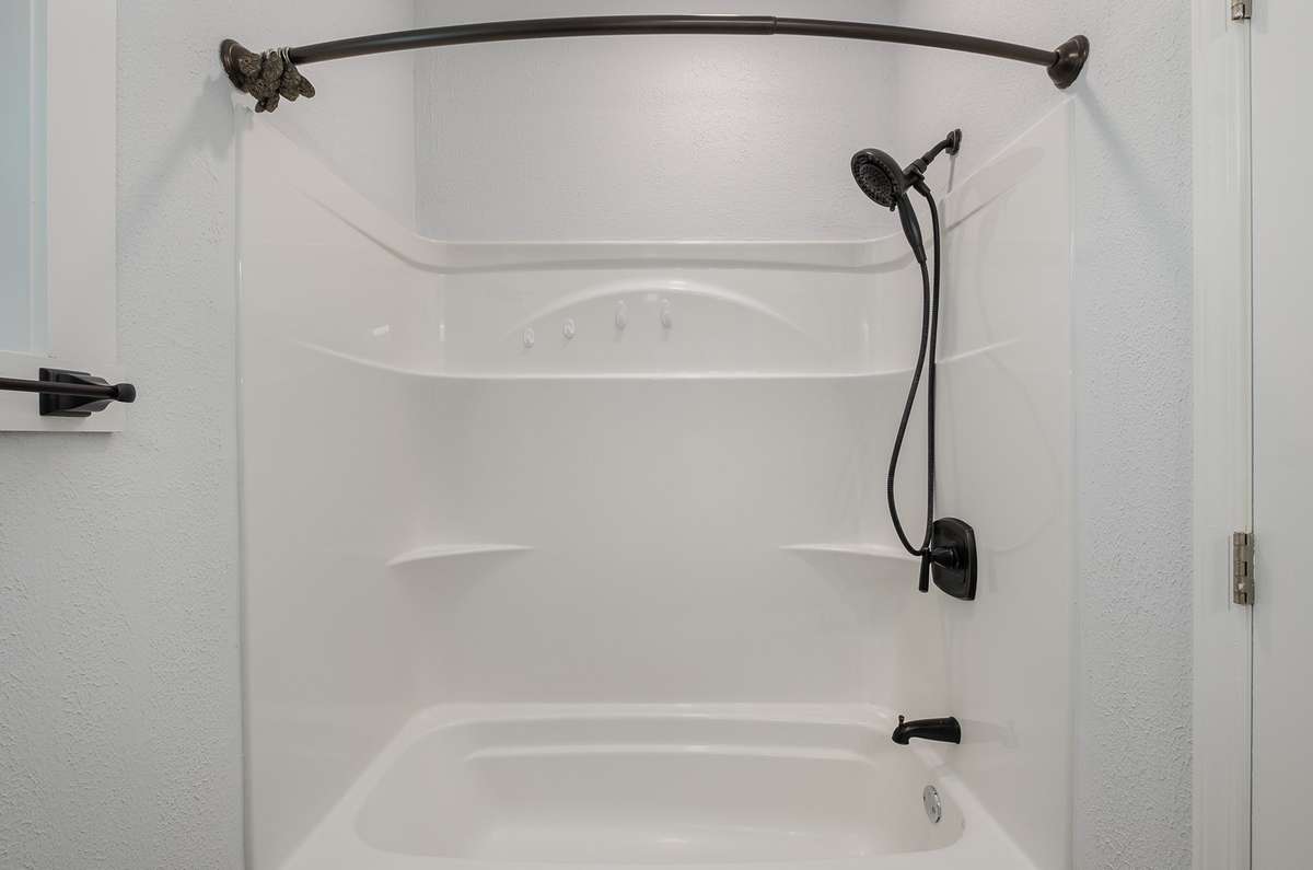 Shower / tub combo with updated fixtures.