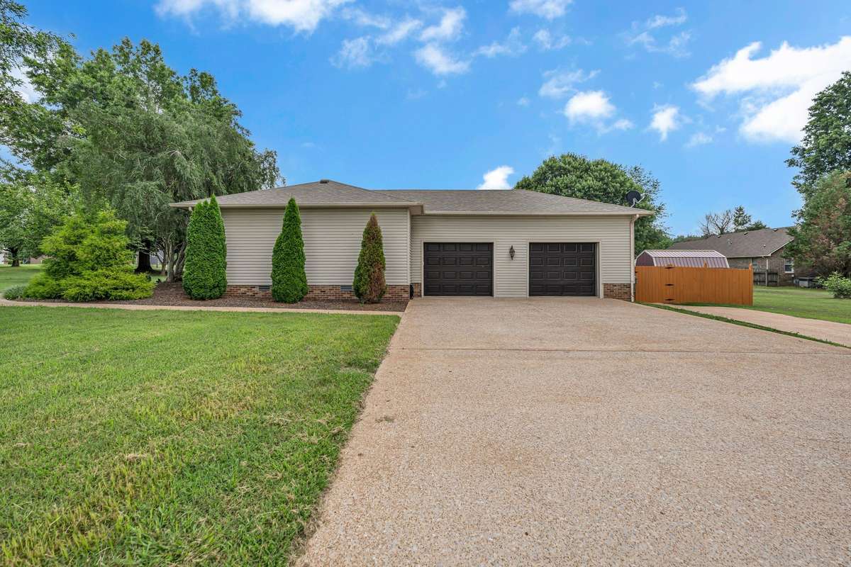 Oversized 2 car garage with large amounts of parking in the driveway as well
