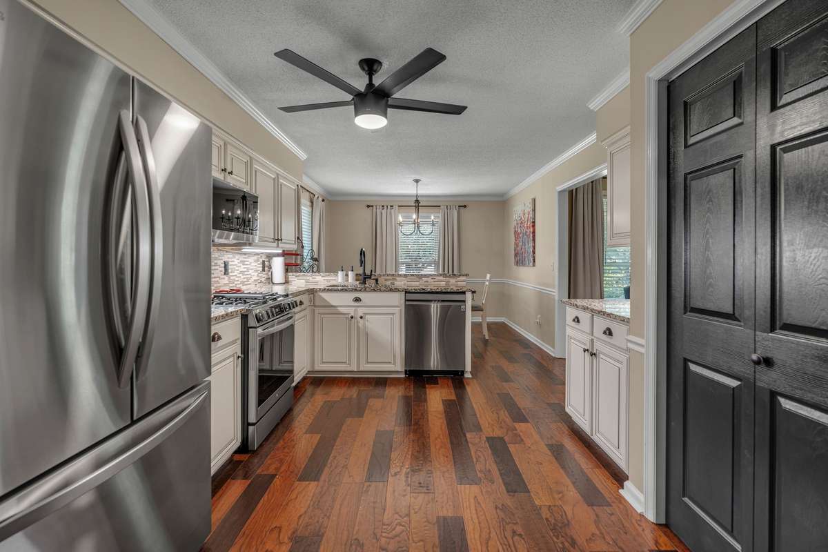 Large kitchen overlooking eat-in dining area