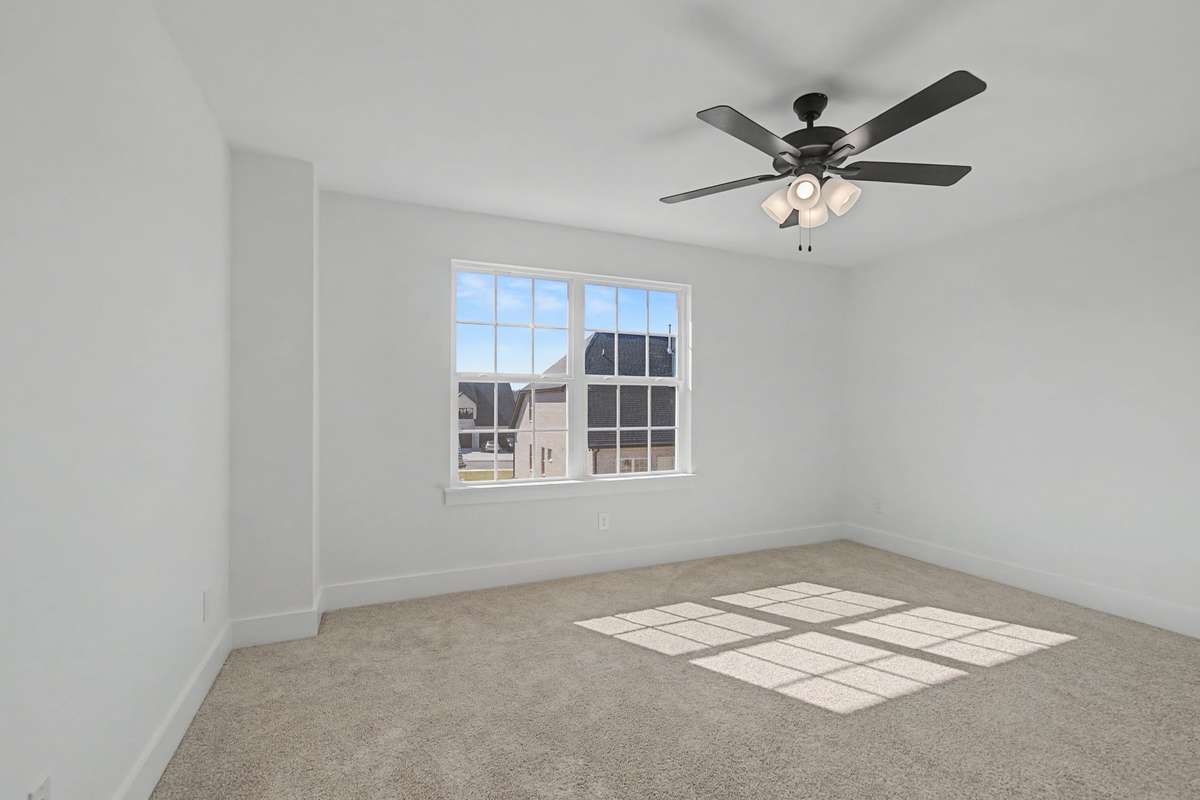Photos of same floor plan but of another finished home in Oak Meadows by Surrey Homes. Photos are for illustration purposes only. Colors and materials may vary.