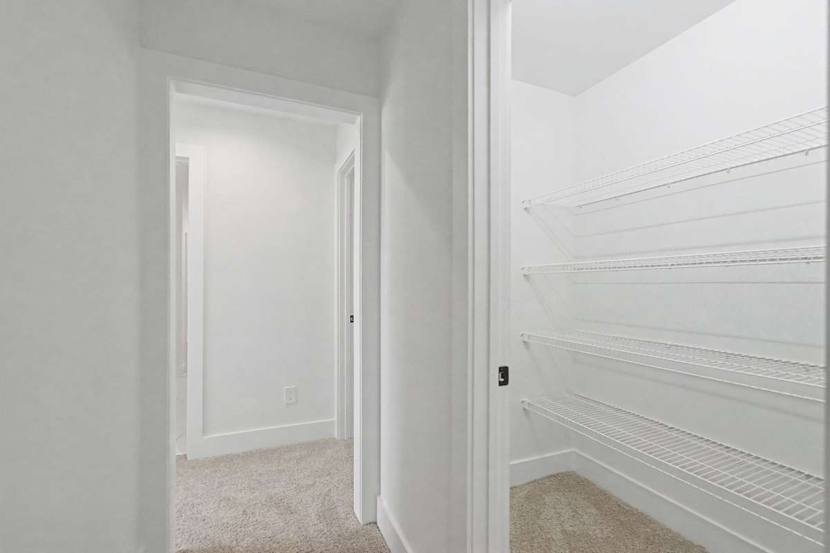 Photos of same floor plan but of another finished home in Oak Meadows by Surrey Homes. Photos are for illustration purposes only. Colors and materials may vary.