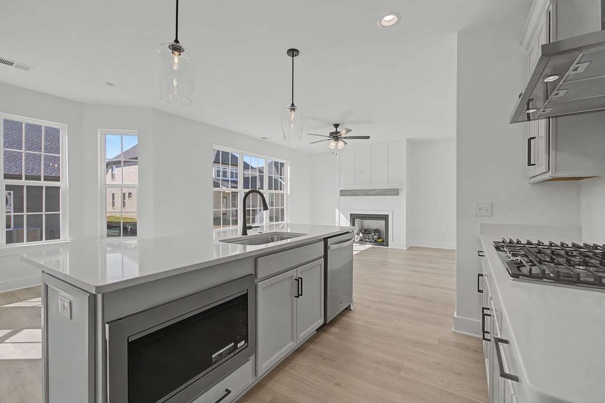 Photos of same floor plan but of another finished home in Oak Meadows by Surrey Homes. Photos are for illustration purposes only. Colors and materials may vary.