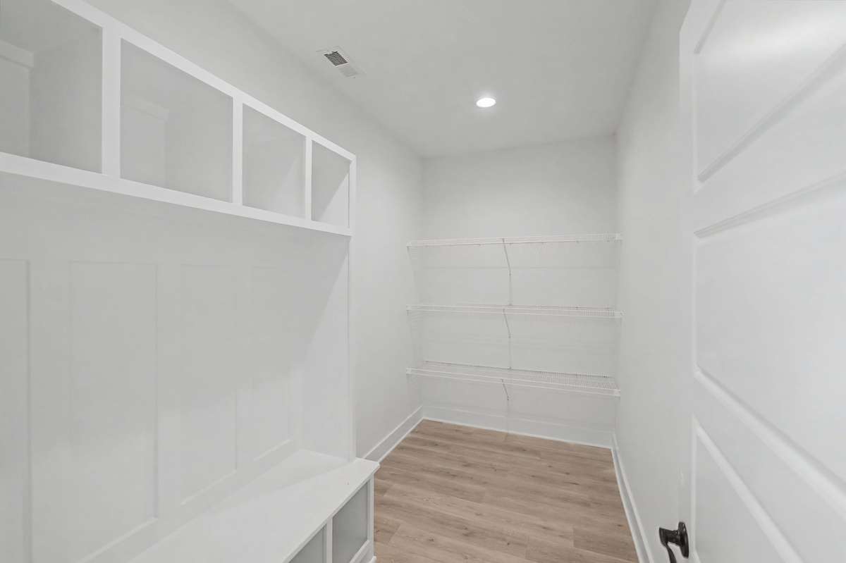 Photos of same floor plan but of another finished home in Oak Meadows by Surrey Homes. Photos are for illustration purposes only. Colors and materials may vary.