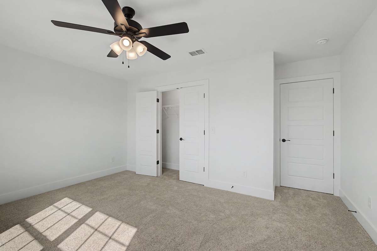 Photos of same floor plan but of another finished home in Oak Meadows by Surrey Homes. Photos are for illustration purposes only. Colors and materials may vary.
