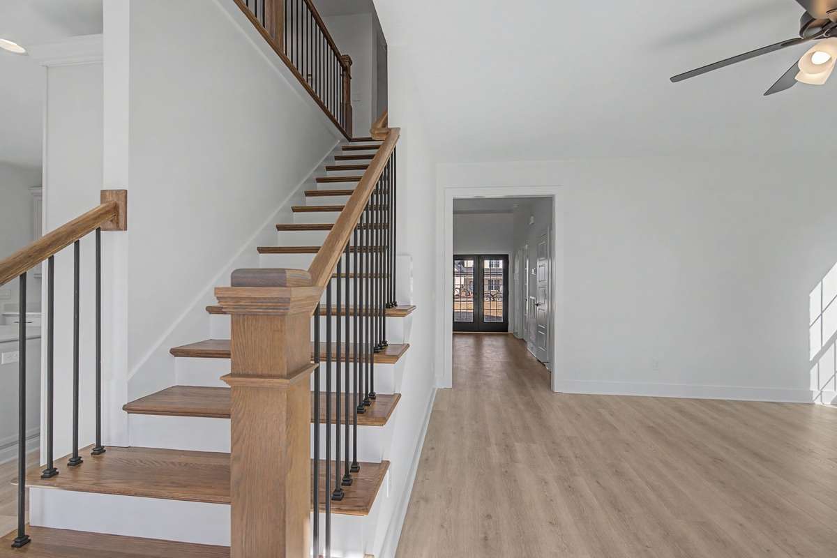 Photos of same floor plan but of another finished home in Oak Meadows by Surrey Homes. Photos are for illustration purposes only. Colors and materials may vary.