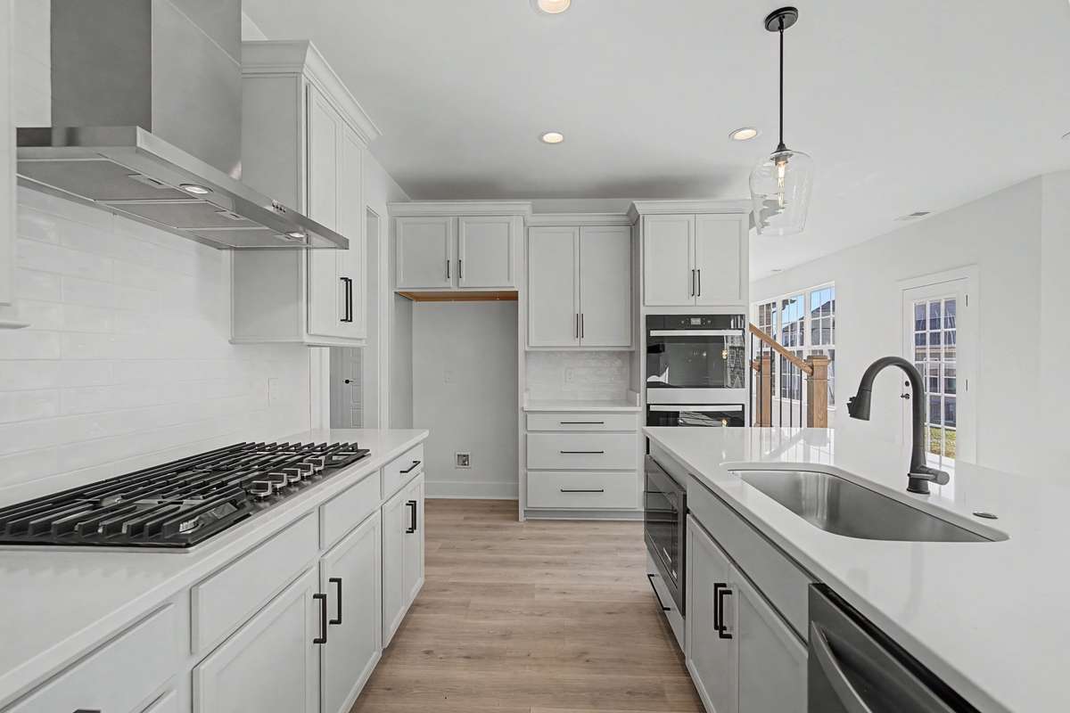 Photos of same floor plan but of another finished home in Oak Meadows by Surrey Homes. Photos are for illustration purposes only. Colors and materials may vary.