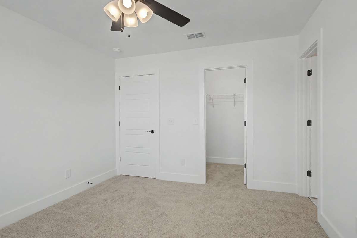 Photos of same floor plan but of another finished home in Oak Meadows by Surrey Homes. Photos are for illustration purposes only. Colors and materials may vary.